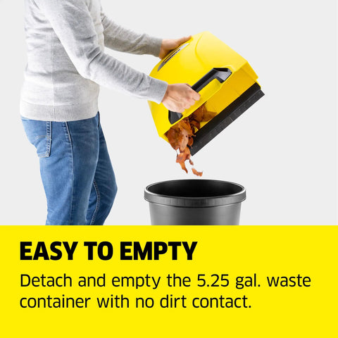 Person emptying 5.25 gal waste container of Walk Behind Outdoor Push Sweeper S 4 Twin for Workshops and Garages Cleans Up to 5 Times Faster Than a Broom