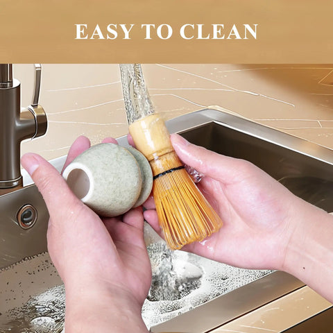 Washing Pro Grade Matcha Whisk Set With 76 Prong Chasen, ceramic mottled green stand under faucet in kitchen sink