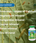Bottle of Bio Calcium Chelated Calcium Complex with Magnesium Zinc Copper Potassium Boron in front of rock climbing wall