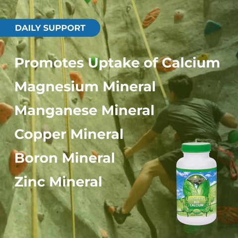 Bottle of Bio Calcium Chelated Calcium Complex with Magnesium Zinc Copper Potassium Boron in front of rock climbing wall