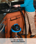 Person using Six Gallon Stainless Steel Wet and Dry Shop Vacuum With 3 Peak HP Motor for kitchen cleanup