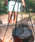 Rugged Heavy Duty Steel Camping Tripod For Open Fire Cooking 43.3 Inch Tall with Dutch oven suspended over fire
