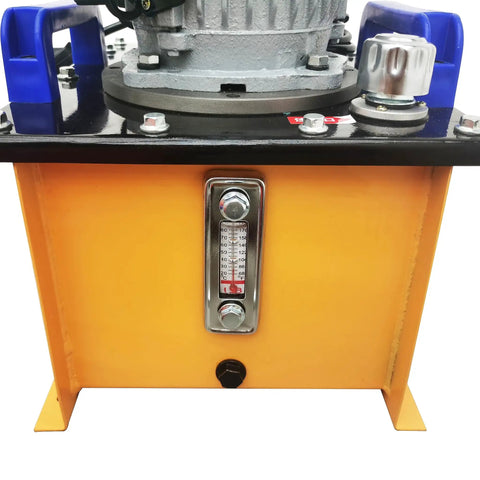 Close-up of the heavy duty 70 ton electric hydraulic track pin press control panel and gauge, showing yellow metal construction.