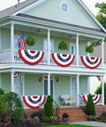 Totally Patriotic 3x6 Ft Pleated Fan Flags Set Of 4 For Fourth Of July And Memorial Day Durable Polyester With Brass Grommets Easy To Hang Half Fan Bunting For 250th Anniversary Celebrations adorning a two-story porch