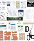 Front view of Everlit 180-piece tactical first aid kit contents with bandages, gauze, scissors, and gloves.
