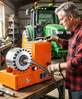 Man using Hot Shot Hydraulic Hose Crimper, Electric High Pressure Machine for hose assembly in workshop.