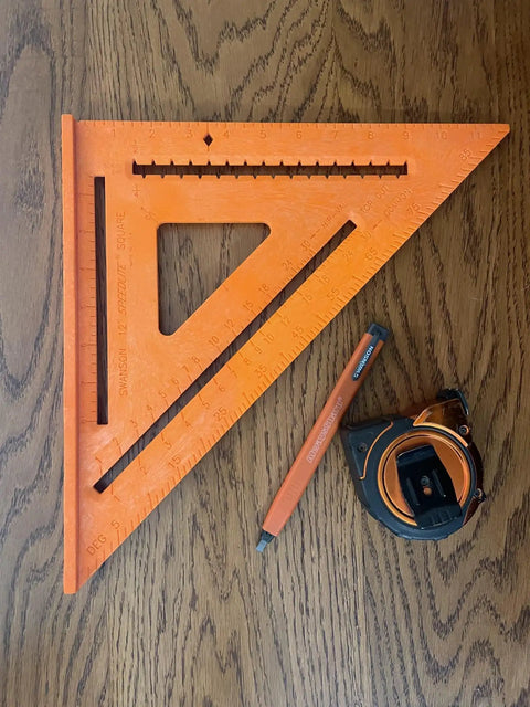 12 Inch Orange Composite Speed Square Layout Tool Built Tough From High Impact Plastic For Siding And Carpentry With One Quarter Inch Notches For Quick Scribing Lines Lightweight Yet Durable And Accurate next to pencil and tape measure on table