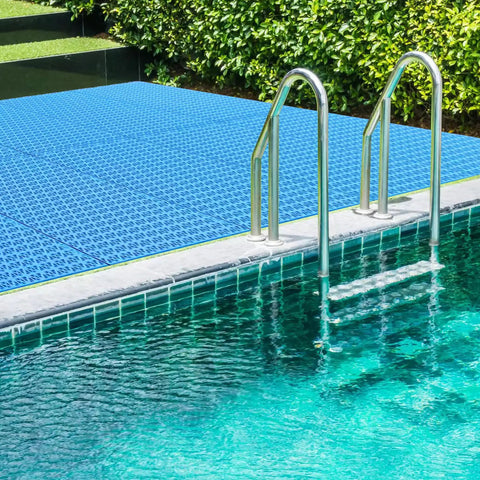 Interlocking Pool Drainage Mats For Above Ground Walkways Keeps Dirt Out Of The Pool 16 Pack Durable Plastic Floor Mats 9.84 By 9.84 Inches installed by poolside.