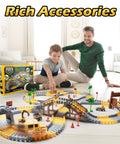 Father and son playing with Glow In The Dark Construction Race Track Set For Kids Ages 3 To 9, 264 Piece Buildable DIY Track