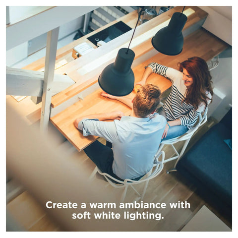 Overhead view of a couple at a table with BR30 Dimmable Smart Flood Light Bulb, 650 Lumens, 9W, Soft White 2700K, Zigbee Hub Required, lit above