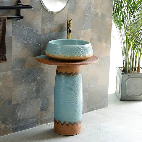 Killer Vintage Ceramic Pedestal Sink Slick Blue Hand Carved Washbasin with wooden top and textured porcelain base.
