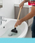 Person using Beefy Heavy Duty Toilet Plunger With Solid Wood Handle And Double Thrust Rubber Cup in sink.