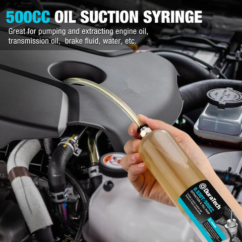 Duratech 500cc oil suction syringe with long hose and extension tubes held in front of car engine bay