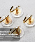 Kick Clutter To The Curb With This Slick Space Saving Wall Hook Designed To Ace Your Entryway Organization Game While Keeping Bathrooms And Bedrooms Tidy Without Taking Up Any Extra Room - clear striped wall hooks with gold accents.