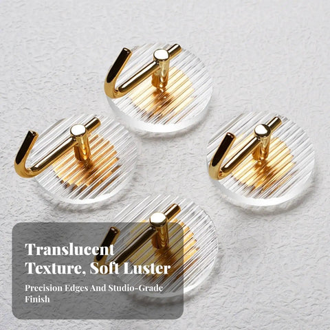 Kick Clutter To The Curb With This Slick Space Saving Wall Hook Designed To Ace Your Entryway Organization Game While Keeping Bathrooms And Bedrooms Tidy Without Taking Up Any Extra Room - clear striped wall hooks with gold accents.