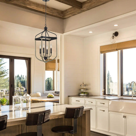 Austen 26 Inch 4 Light Modern Farmhouse Lantern Pendant Light With Adjustable Foyer Chandelier In Smoked Birch Finish hanging in kitchen area.