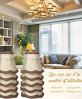 10 Pack European Mini Lamp Shades For Chandeliers displayed in a living room, featuring rustic gold tone and glitter lace trim.