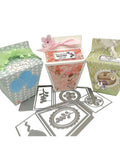 Three decorative gift boxes made using Milk Box Gift Box Die Cut Set For Paper Craft And Scrapbooking, with metal cutting dies shown.