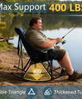 Man fishing in a Big And Tall Rocking Camping Chair With 400 Lb Capacity, Heavy Duty XL Folding Rocker For Adults by a lake