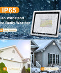 JUDYSSY Outdoor 100W Led Outdoor Flood Light in rain showing IP65 waterproof feature, suitable for harsh weather conditions.