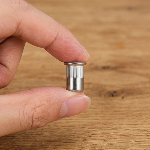Close-up of a single M6 knurled stainless steel blind rivet nut from the 50 Pack M6 Knurled Stainless Steel Blind Rivet Nuts Set.