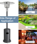 Outdoor Patio Heater With 50,000 BTU Propane Heater, Stainless Steel Burner, Wheels, And Triple Protection, standing on a patio