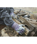 Heavy Duty Work Gloves For Landscaping And Gardening, 12 Pair Pack With Safety Cuff And Wing Thumb gripping firewood.
