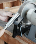 Total No Sweat Setup For Your Shop This Upgraded Grinding Jig System with a bowl gouge on a sturdy jig by an eight inch grinder.