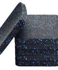 Stack of six heavy duty treadmill mat pads for home gym, black rubber with blue flecks, 0.5 inch thick for vibration reduction.