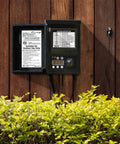 200W Low Voltage Outdoor Transformer With Weatherproof Housing And Photo Sensor For Landscape Lighting on wooden wall