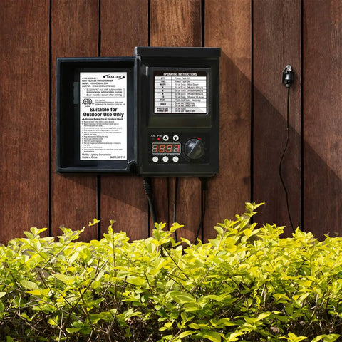 200W Low Voltage Outdoor Transformer With Weatherproof Housing And Photo Sensor For Landscape Lighting on wooden wall