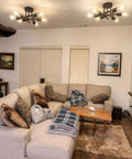 Six Arm Semi Flush Mount Ceiling Light Fixture Modern Black Sputnik Chandelier Lighting in a living room setting