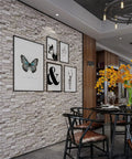 No Mess Peel And Stick 3D Faux Brick Wall Panels Set Of 20 Self Adhesive Foam Tiles Renters Friendly Removable Accent Wall Decor For A Top Notch Room Upgrade in a dining area with artwork.