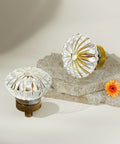 Dope Crystal Cabinet Knob Set, 8 Pack Glass Crystal Vintage Hardware In Antique Brass Bronze Finish on beige background