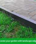 No Dig Landscape Edging Kit With 60 Spikes, 4 Inch Tall 66 Foot Border installed on lawn next to pathway