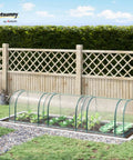 11 By 3 By 2.5 Ft Mini Greenhouse Portable Tunnel With Roll Up Zippered Doors set in a backyard garden.