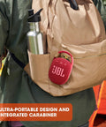 Clip 4 Portable Bluetooth Speaker With Carabiner IP67 Waterproof Dustproof 10 Hours Of Playtime Booming Sound In A Pocket Sized Tough Package For Home Outdoor Travel Pink attached to a backpack.