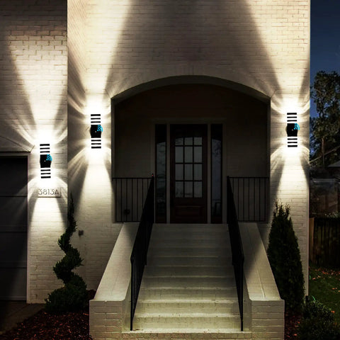 Dusk To Dawn Outdoor Wall Light 3 Layer Up And Down Matte Black IP65 Waterproof Exterior Sconce illuminating a beige brick porch