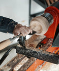 Heavy Duty Woodturning Hollowing Tool With Replaceable Carbide Tipped Round Blade And Solid Beech Handle in use on a lathe.