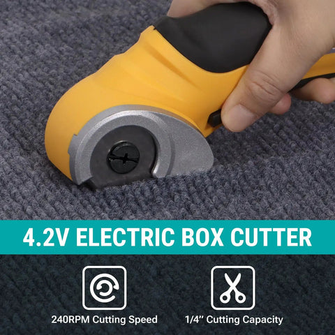 Hand using yellow Beefy Cordless Electric Scissors With Safety Lock 4.2V Rechargeable Box Cutter on carpet surface.