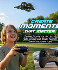 Child flying Dope RC Stunt Plane For Kids And Adults With 3x Battery Life, LED Jet Fighter, outdoors with remote control.