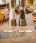 Stainless steel pepper grinder and salt mill on table, Pepper Grinder With Adjustable Six Level Grind, Stainless Steel Mill.