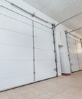Heavy Duty Garage Door Torsion Spring Kit With Cables And Brackets installed on 7 ft tall doors in a garage