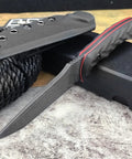 Fixed Blade Knife With D2 Steel Blade, textured G10 handle, and Kydex sheath, displayed on a rope with sheath beside it.