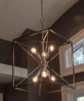 Six Light Sputnik Pendant In Brushed Steel And Glass, glam industrial ceiling light for living room, geometric frame, lit bulbs