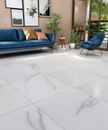 White Peel And Stick Floor Tiles 12x12 Inch 16 Pack Waterproof Vinyl Flooring in a living room with modern furniture and plants