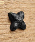 Colonial Era Solid Cast Iron Decorative Nailhead Studs For Doors, Cabinets And Furniture in rustic black on wood surface