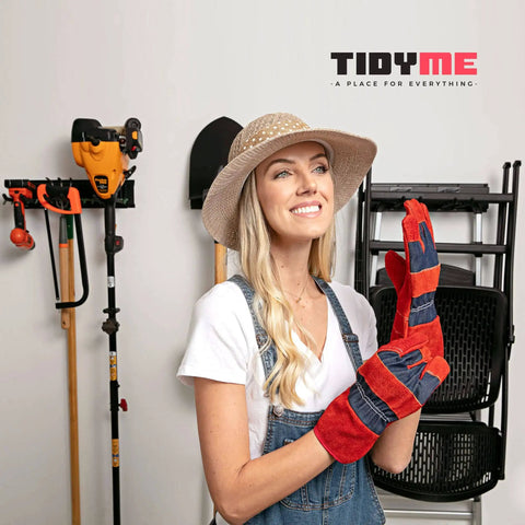 Woman in a hat and gloves next to Garage Tool Organizer Wall Mount 32 Inch Heavy Duty Rack With Adjustable Hooks Anti Rust Easy Install