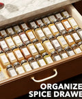 No Sweat Adjustable Bamboo Spice Drawer Organizer Expands To Fit Any Kitchen Cabinet Slot with neatly arranged spice jars.