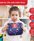 Child holding Kids First Aid Kit 246-Piece Bundle For Travel, Home, And Car Emergency Needs in a blue portable mini bag.